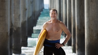 man met surfbord